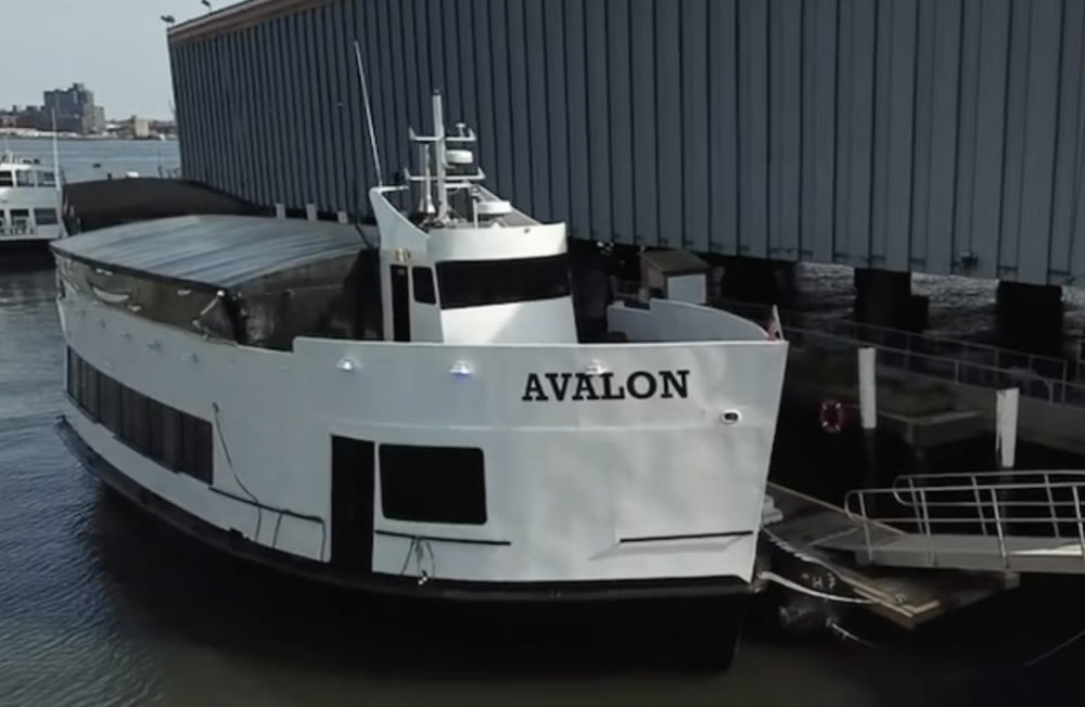 Avalon, a Harbor Social tour and party yacht, docked at Skyport Marina